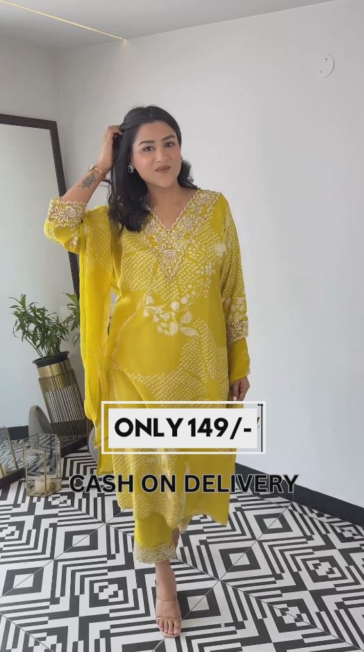 Emroided Yellow Schiffly Suit With Organza Dupatta