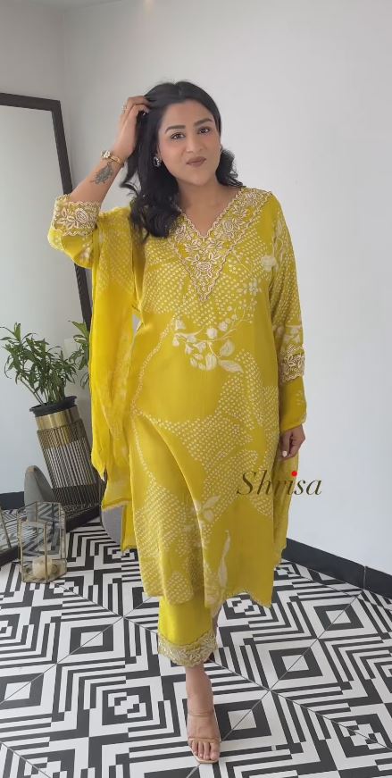 Emroided Yellow Schiffly Suit With Organza Dupatta