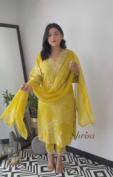 Emroided Yellow Schiffly Suit With Organza Dupatta